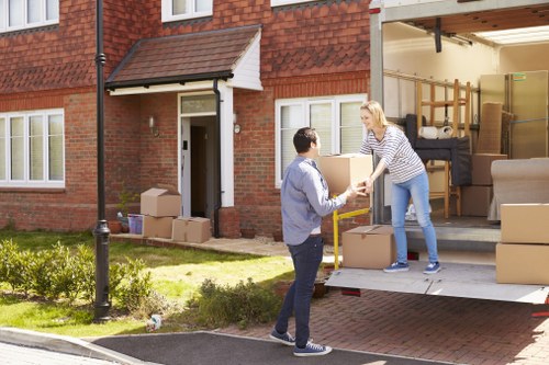 Moving van and apartment block for flat removals in Uxbridge