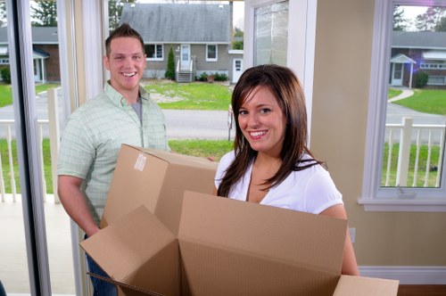 Loading furniture into a van for removals in Uxbridge