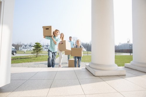 Safe handling and lifting practices during a man with a van service