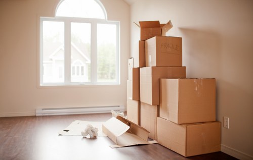 Packed boxes and furniture ready for a house move in Uxbridge
