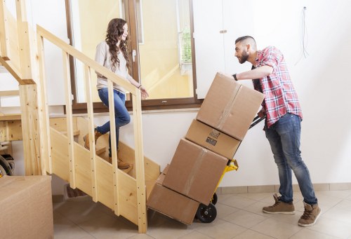 Staff completing a pre-move risk assessment checklist