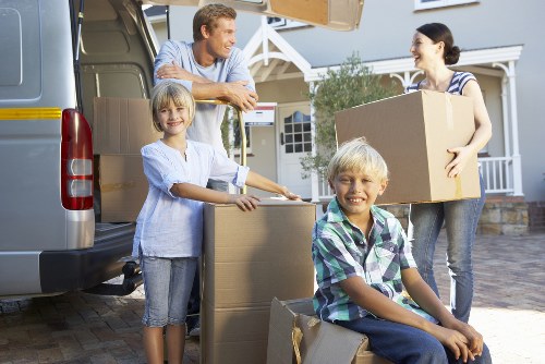 Careful wrapping and transport of a grand piano during a move