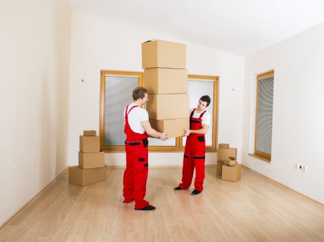 Loading furniture into a moving truck in Uxbridge